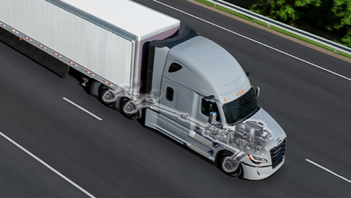 Aerial view of Class 8 semi truck with transparent chassis showing drivetrain components on highway